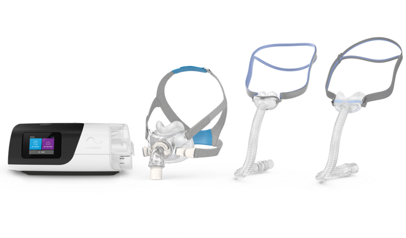 ResMed Airsense 11 CPAP machine and masks on a white background