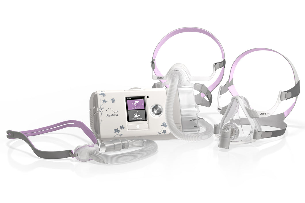 ResMed Airsense 10 For Her CPAP machine with masks on a white background